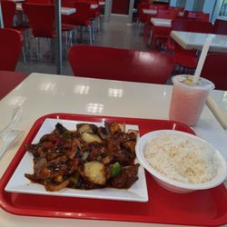 Hoja Asian Fusion - Fresh from the wok pork, mushrooms, and peppers dish. I made it hot. Added rice and watermelon slush drink.