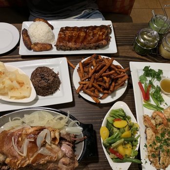 La Esquina del Lechón - Baby back ribs, moro rice, lechon, veggies, parrot fish with scramp - Cuban Near Me - Doral, Florida La Esquina del Lechón - Baby back ribs, moro rice, lechon, veggies, parrot fish with scramp - Cuban Near Me - Doral, Florida