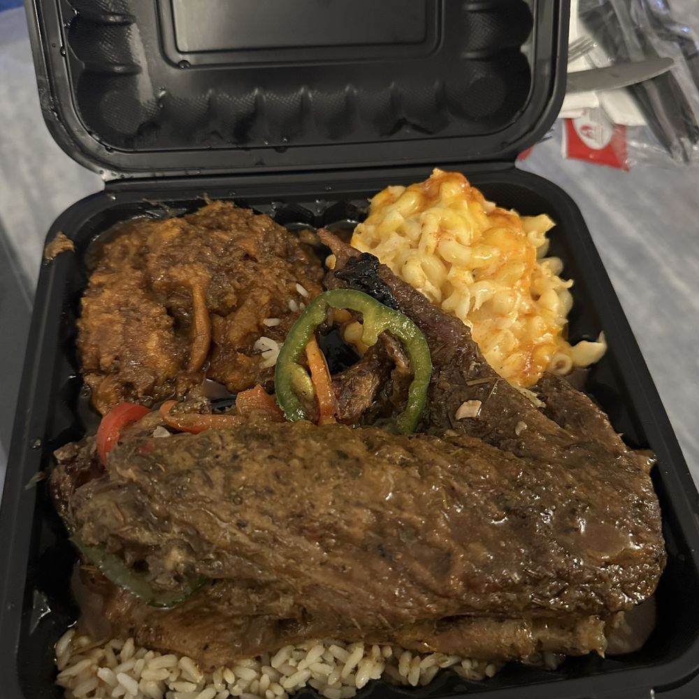 Smothered turkey wings, Mac & Cheese, Yams.