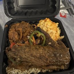 Smothered turkey wings, Mac & Cheese, Yams.
