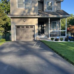 Ketcham Fencing - Frontal view of the house with fence. Wow!
