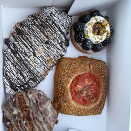 A box of four pastries.
