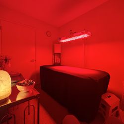 Lymph And Scars Massage Therapy - Medical-grade post-op modalities including integrated red light therapy and specialized positioning wedges for safe, comfortable fluid drain