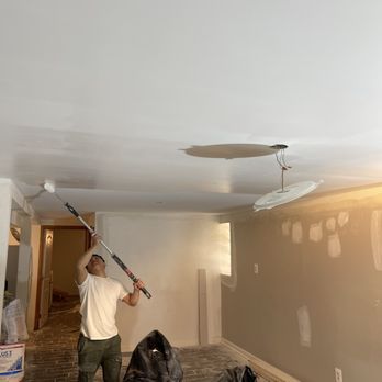 Prismatic Painting Pros - Applying primer - Painters Near Me Prismatic Painting Pros - Applying primer - Painters Near Me