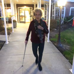 She went from a walker to a cane due to better leg strength