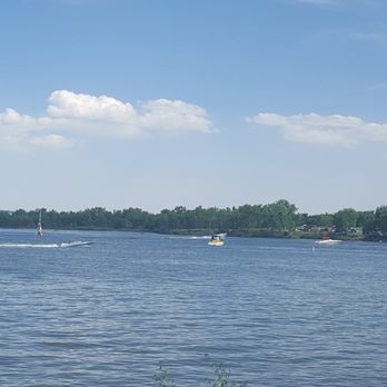 Cherry Creek Reservoir - Paddleboards $26/ hr, jet skis $86 and the little shack where you can pay for that has $40 boardshorts. - Lakes Near Me - Aurora, Colorado