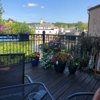 Bleuroot - Sitting on the patio overlooking the river - New American Near Me - West Dundee, Illinois