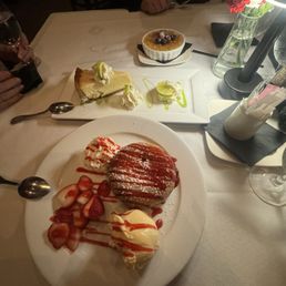All three desserts. Closest is the butter cake, then Keylime, the farthest is the creme brulee. All three desserts. Closest is the butter cake, then Keylime, the farthest is the creme brulee.