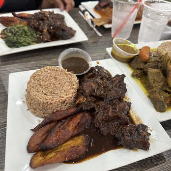 Roland's Jamaica Chicken - With side gravy. So GOOD and tender - Caribbean Near Me - Lewisville, Texas