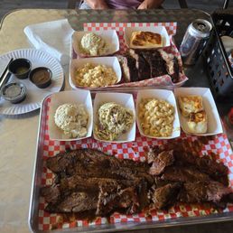 Brisket, tri-tip, and baby back ribs along with the sides. Brisket, tri-tip, and baby back ribs along with the sides.