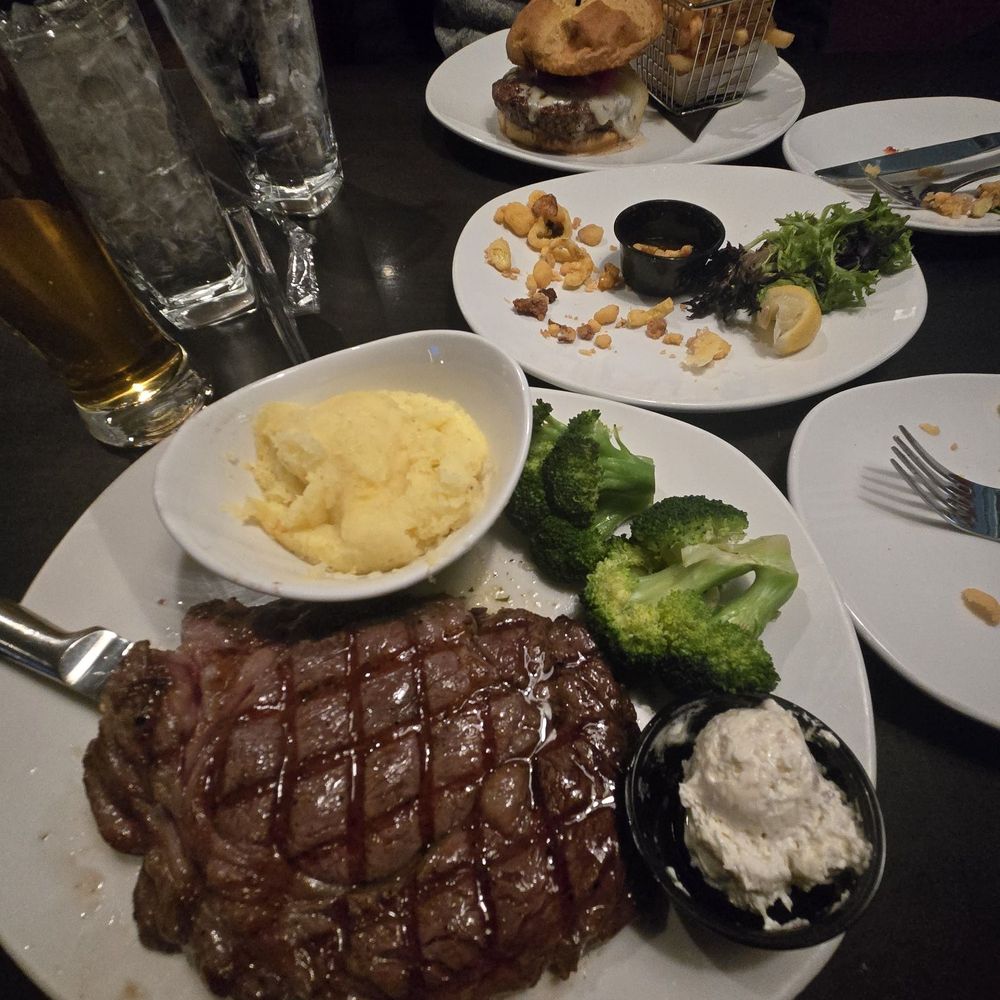 Dry aged ribeye and 110 Signature burger. Dry aged ribeye and 110 Signature burger.