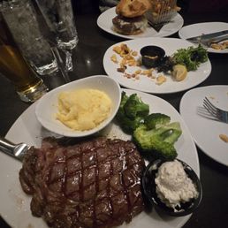 Dry aged ribeye and 110 Signature burger. Dry aged ribeye and 110 Signature burger.