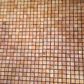 A & J Contracting - a close up of a tiled floor - General Contractors Near Me