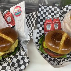 Taste Of 210 - Our 5-0 burger and Clasico burger with fries and hand pies