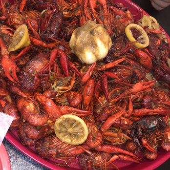 Smitty's Seafood - Boiled crawfish with a garlic head added - Seafood Near Me - Kenner, Louisiana