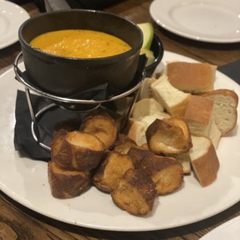 Local Goat - Cheese fondue.  Pretzel was definitely spot on for dipping. - New American Near Me - Pigeon Forge, Tennessee