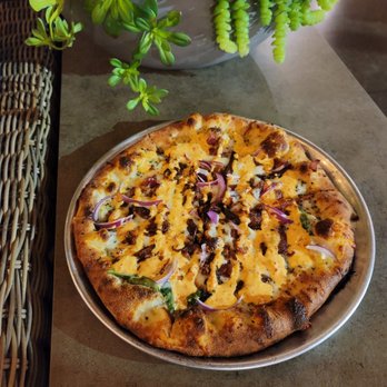 Noble Funk Brewing - a pizza with onions and cheese - Brewpubs Near Me - Louisville, Kentucky Noble Funk Brewing - a pizza with onions and cheese - Brewpubs Near Me - Louisville, Kentucky