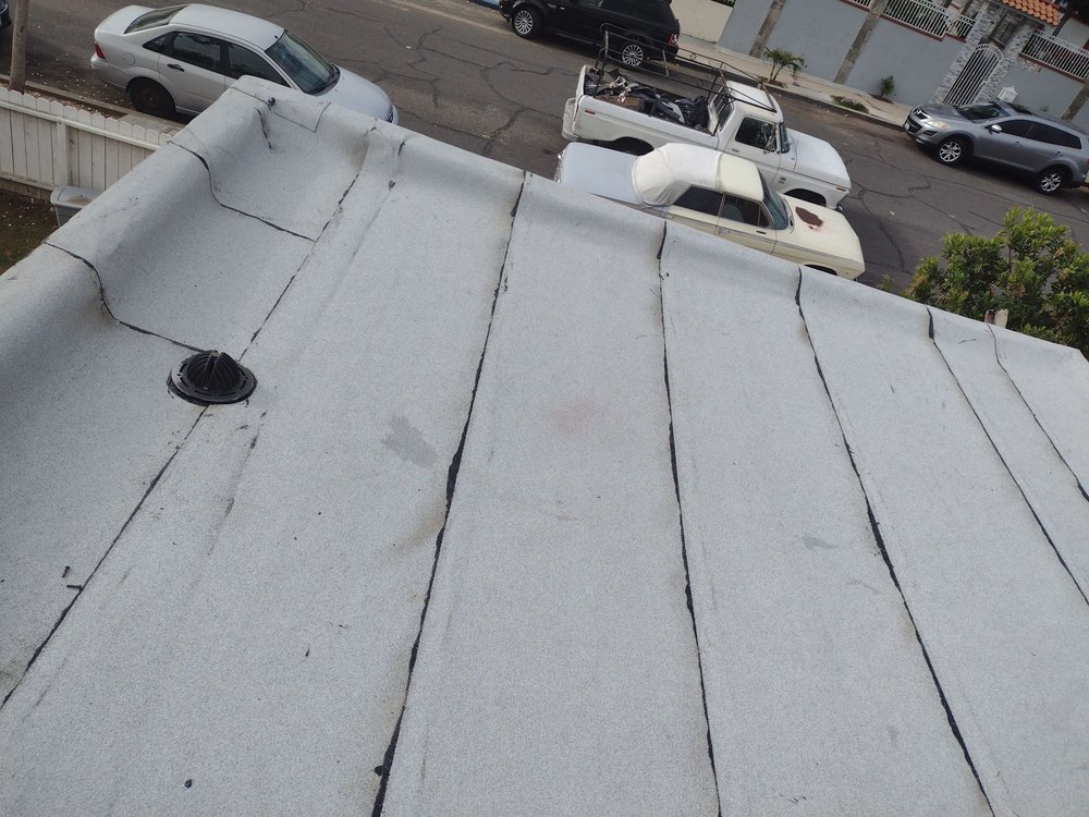 Slide of Mendez roofing