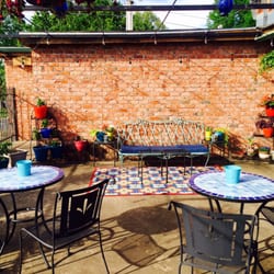 Pasti Italian Grill - Outdoor seating and fresh herbs available during spring and summer seasons!