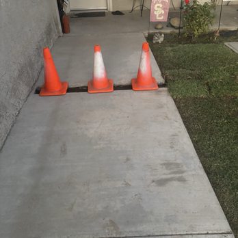 Solid Plumbing Services - Where he had to take a small area of my walkway to fish under the drain line to connect to the main sewer line - Plumbing Near Me - Fontana, California Solid Plumbing Services - Where he had to take a small area of my walkway to fish under the drain line to connect to the main sewer line - Plumbing Near Me - Fontana, California