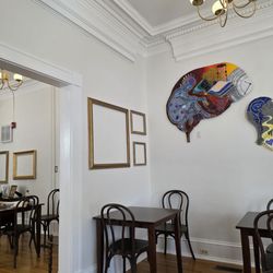 Canvas & Coffee Art Cafe - The interior of the Café with the current Local Artist Exhibition.