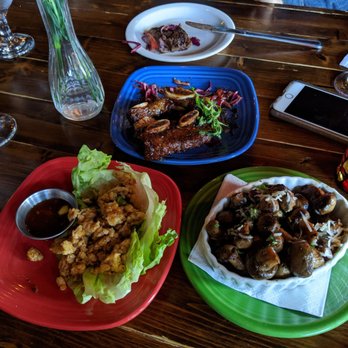 Santiago's Bodega - Chicken lettuce wraps, braised short ribs, mushroom scampi - Tapas Bars Near Me - Orlando, Florida Santiago's Bodega - Chicken lettuce wraps, braised short ribs, mushroom scampi - Tapas Bars Near Me - Orlando, Florida