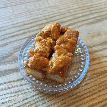 Ernest - Uni toast with egg yolk on brioche - New American Near Me - San Francisco, California