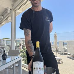 Scala dei Turchi - Amazing Sommelier and the wonderful bottle of "Chardonnay like" wine.