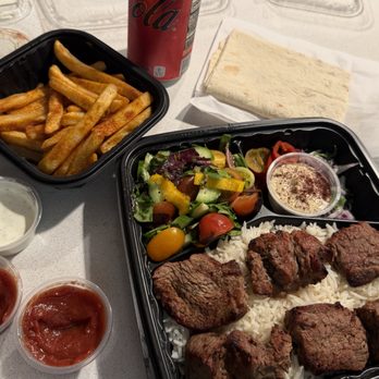 Flamin Flavor Shawarma & Grill - Takeout: BBQ beef plate with rice + side of fries. Lavash was included. - Mediterranean Near Me - Glendale, California Flamin Flavor Shawarma & Grill - Takeout: BBQ beef plate with rice + side of fries. Lavash was included. - Mediterranean Near Me - Glendale, California