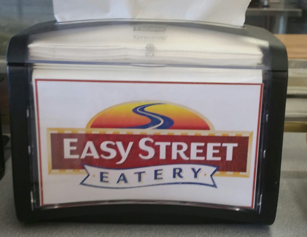 Nice N Easy Grocery Shoppes Logo