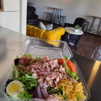 Good Mood Cafe - a salad in a plastic container - Cafes Near Me Good Mood Cafe - a salad in a plastic container - Cafes Near Me