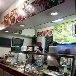 a woman ordering food in a restaurant