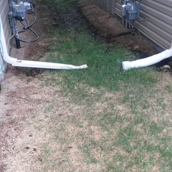 Larlyn Property Management - Looks like a dryer vent. Oh look at the grass that the landscaping company is supposed to attend to! - Property Management Near Me - Edmonton, Alberta