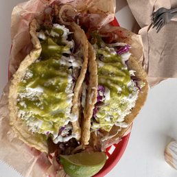 Fish taco and pork taco. Fish taco and pork taco.