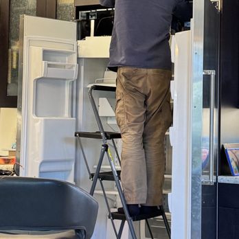 10xRepair Services - Sean disconnecting the compressor - Appliances & Repair Near Me