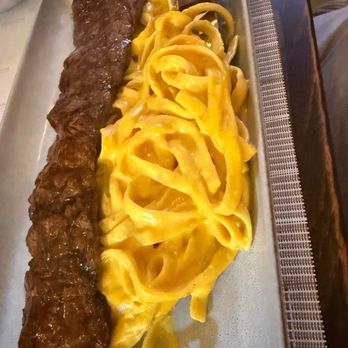 The Nazca Lines - Huancaina Fettuccine with Churrasco. - Peruvian Near Me - Longwood, Florida The Nazca Lines - Huancaina Fettuccine with Churrasco. - Peruvian Near Me - Longwood, Florida