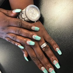 T J Nails