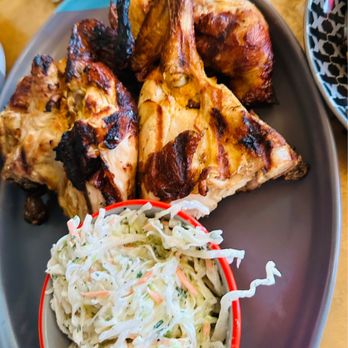 Nando's Peri-Peri - Our half chicken with Coleslaw. - Portuguese Near Me - Laurel, Maryland