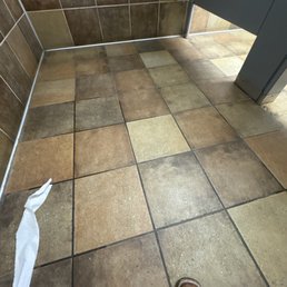 Filthy bathroom that smells like pure piss everywhere, really disgusted!