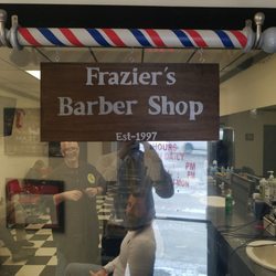 Frazier's Barber Shop - As you walk in, see Klay about to cut another frequent customer's hair.