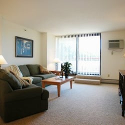 Village Shores Senior Community - Living Room apartment at Village Shores Senior Community in Richfield, MN.