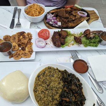 Aria Suya Kitchen - Fufu (mixed egusi and spinach) with beef, suya meats sampler with jollof rice, and wings. - African Near Me - Houston, Texas Aria Suya Kitchen - Fufu (mixed egusi and spinach) with beef, suya meats sampler with jollof rice, and wings. - African Near Me - Houston, Texas