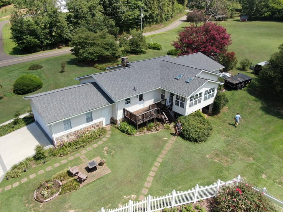 Slide of AMI Roofing