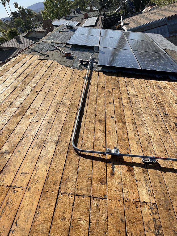 Slide of Oscar Roofing  services