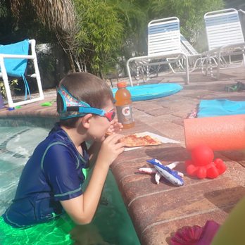 Danny's Pizzeria - Pizza in the pool!! - Pizza Near Me - Bradenton, Florida
