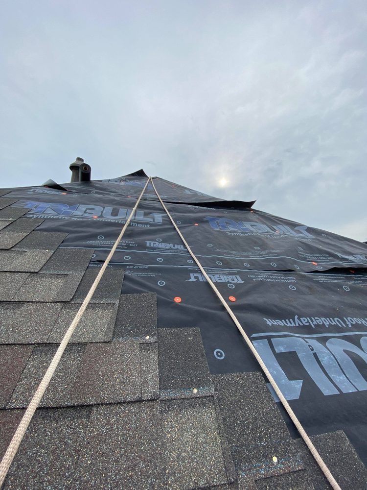 Slide of CM Roofing Pros