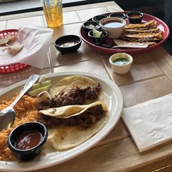 Los Cuatro Hermanos Mexican Restaurant - Birria tacos and rice, chips and salsa almost finished while we waited for orders to be ready