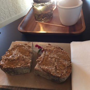 Deeper Roots Coffee - Silver needle w 12 grain toast - Coffee & Tea Near Me - Cincinnati, Ohio Deeper Roots Coffee - Silver needle w 12 grain toast - Coffee & Tea Near Me - Cincinnati, Ohio