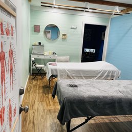 Main massage room with beds Main massage room with beds