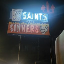 Exterior outside entrance of Saints & Sinners - Signage outside, ICONIC! - Española, New Mexico Exterior outside entrance of Saints & Sinners - Signage outside, ICONIC! - Española, New Mexico
